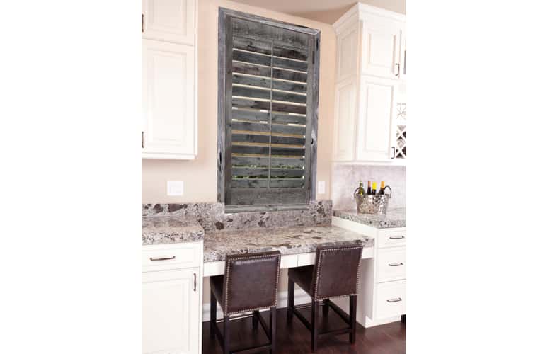 Reclaimed wood shutters on kitchen window in Fort Lauderdale